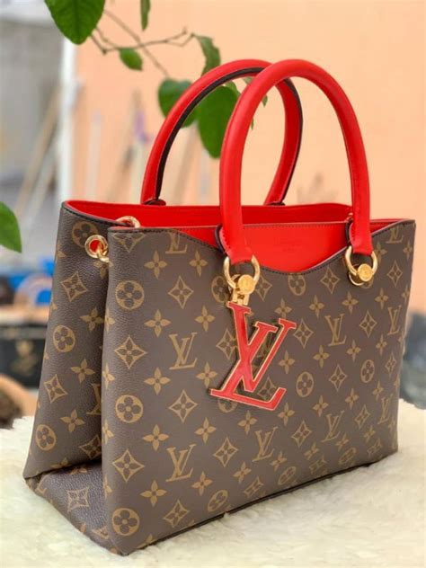 sac a main louis vuitton rouge|Louis Vuitton sac weekend.